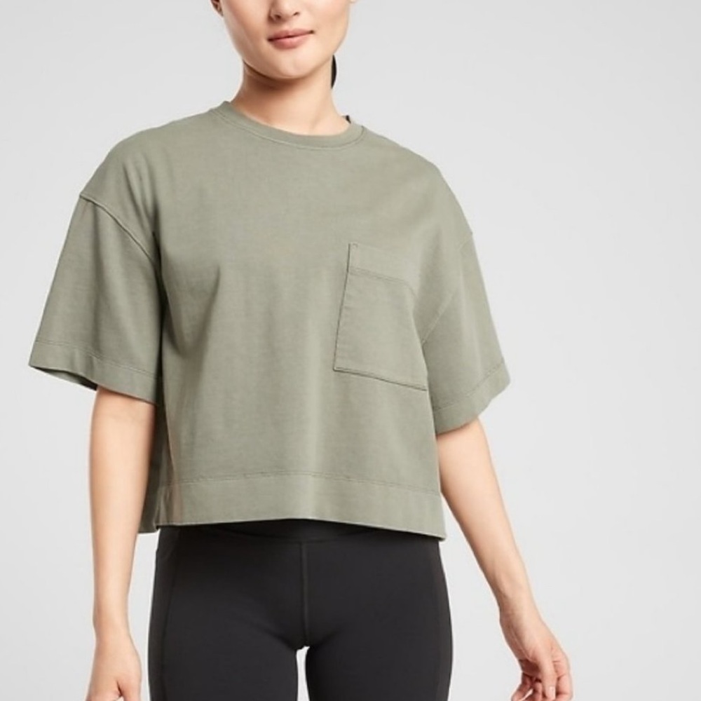 white oversized athleta crop tee with front pocket
